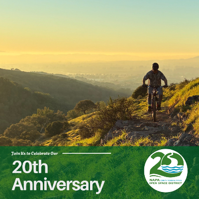 Photo of a bike on a trail in Suscol Headwaters Park with text that reads Join us to celebrate our 20th Anniversary and the 20th Anniversary NOSD logo
